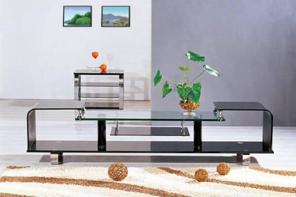 Kệ tivi phòng khách bằng kính kiểu dáng cách điệu mềm mại